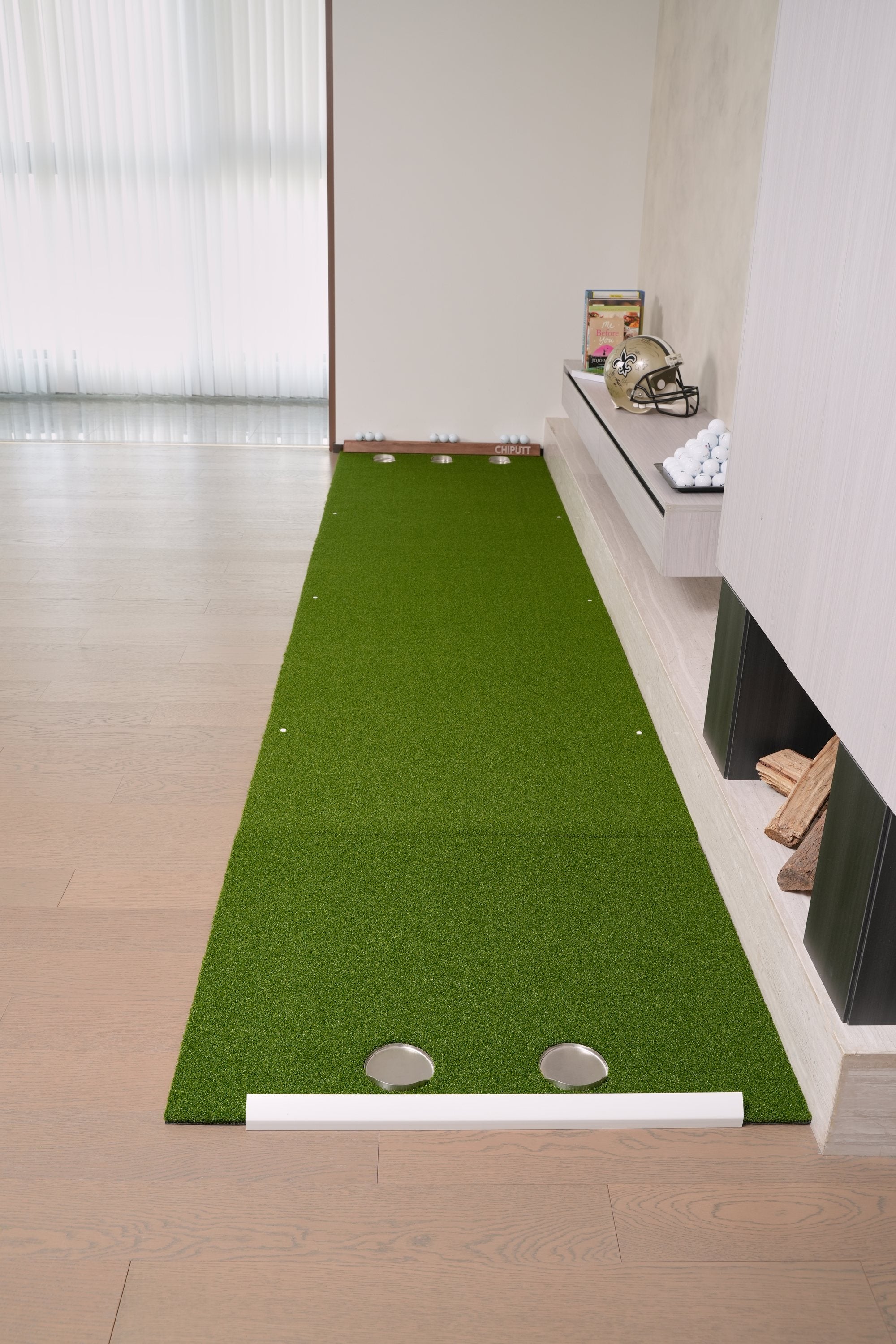 Chiputt dual-hole chipping mat connected to the front of the 3ft x 11ft putting mat for two-way putting, vertical view