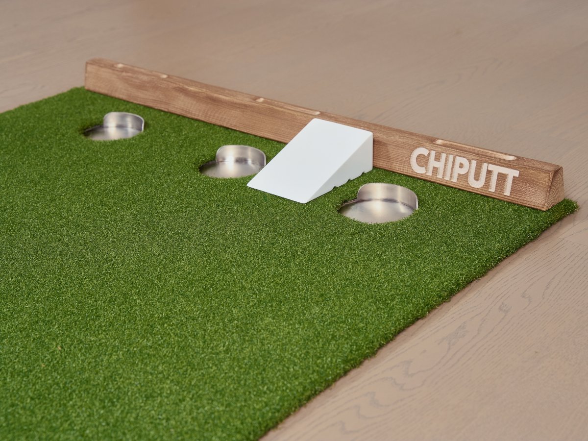 Chiputt 2025 putting mat with PaceMaster ramp, chipping mat, dual cup designs, and stimp 10 true-roll turf — master putting distance control and accuracy at home.